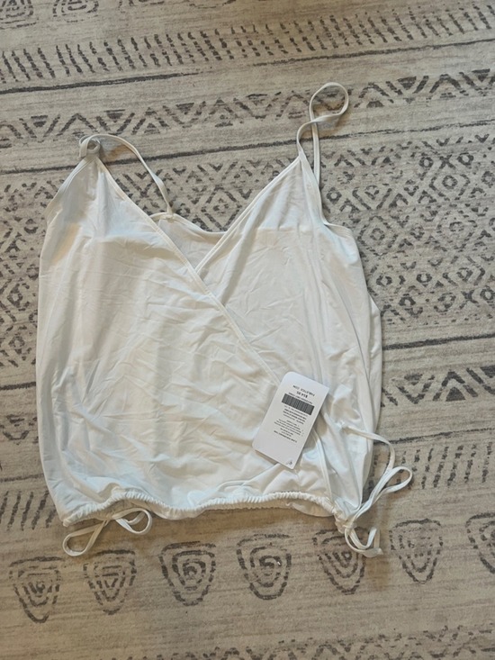 Fabletics Tops - Fabletics White Wrap-Front top. Perfect for workout or weekends